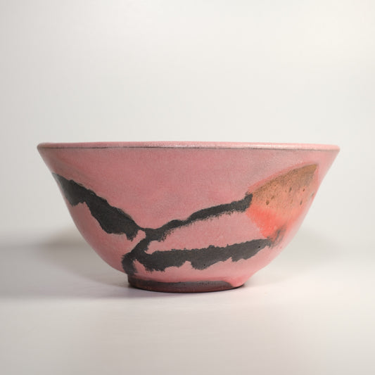 Bright Orange and Black Flower on Pink Bowl