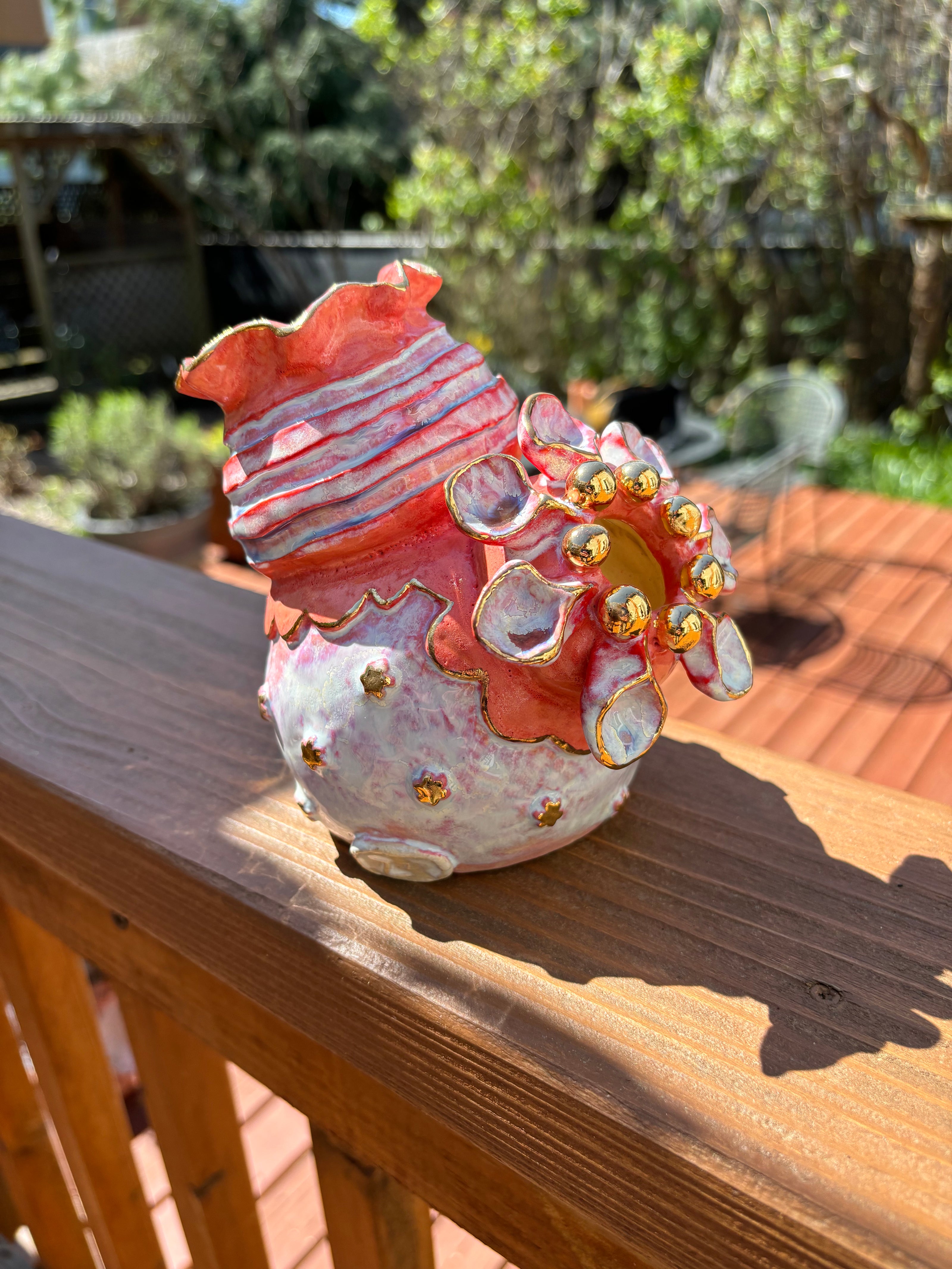 abstract orange floral ceramic sculpture 