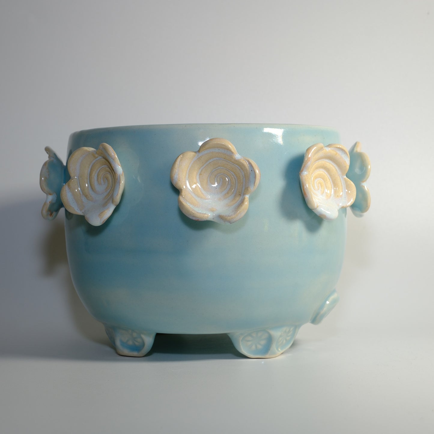 Baby Blue Footed Planter with Spiral White Flowers