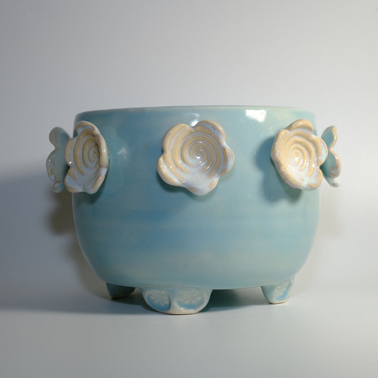 Baby Blue Footed Planter with Spiral White Flowers